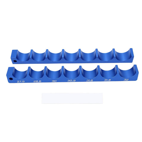 Tbest Heavy Duty Aluminum Alloy Bike Fork Hub Clamp Vise Fixture Bench Tool for 27.9 to 32mm sizes arranged in blue holders.