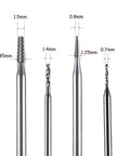 Four tungsten steel drill bits from Cordless Rechargeable Broken Screw Extractor Kit, varying sizes for DIY fixing.
