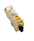Angled brass PV2 proportioning valve for disc/drum brakes; yellow seals, white plastic plunger, black actuator.