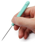 Next Level Cookie Scribe Needles For Home Bakers, 5.2 Inch Precision Icing Art Pins held in hand for precise cookie decorating.