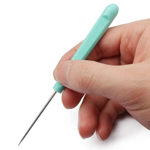 Next Level Cookie Scribe Needles For Home Bakers, 5.2 Inch Precision Icing Art Pins held in hand for precise cookie decorating.