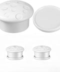 Two white circular magnetic cabinet locks with lids, part of the Magnetic Cabinet Locks For Babies Easy No Tool Install set.