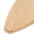 Close-up of beech wood biscuit for woodworking showing texture, part of solid wood biscuits for woodworking, stronger glue bonding.