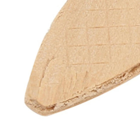 Close-up of beech wood biscuit for woodworking showing texture, part of solid wood biscuits for woodworking, stronger glue bonding.