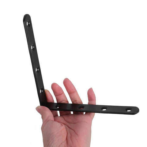 Hand holding Heavy Duty Stainless Steel Straight Brackets Set Of 4 For Furniture Repair And Reinforcement