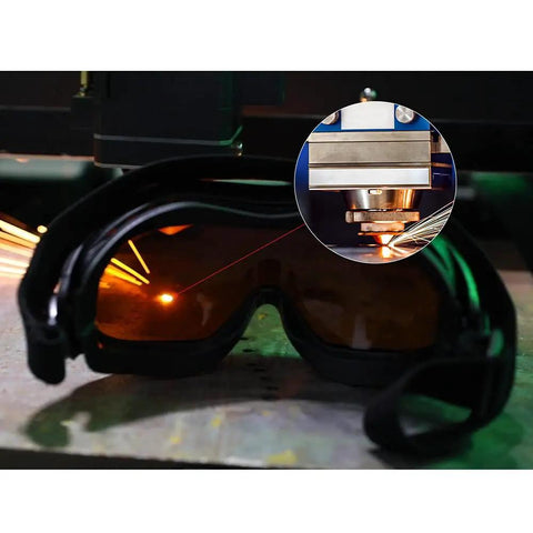 Heavy Duty Laser Safety Glasses And Protective Goggles Engineered For Fiber Handheld Welding Rigs With Hella Thick OD 7 Shields on a work surface.