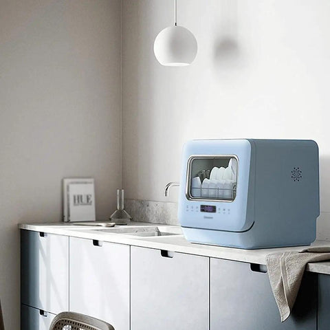 Pretty Slick Countertop Dishwasher Fully Automatic Stainless Steel With Six Place Settings LED Display And Delay Start Quick Connect Faucet Adapter Smooth Hassle Free Setup on kitchen countertop with LED screen.