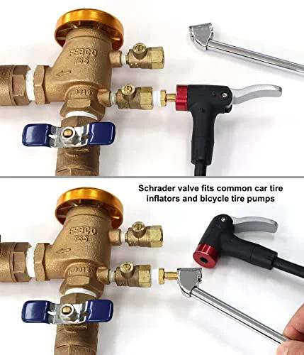 Front view of lead-free brass Schrader valve to male NPT adapter on sprinkler backflow preventer with blue-handled valves.