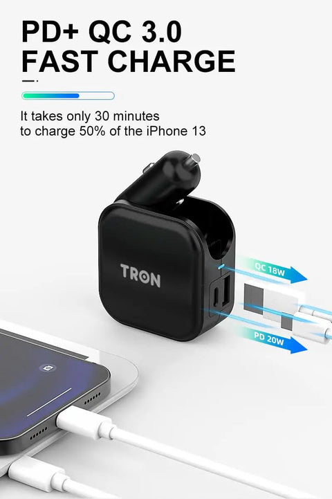 Game Changer 36W Fast Charger With Straight Up Dual Usb C And Universal Usb A Ports For Phones Tablets And Earbuds Compact Wall Car Adapter next to a smartphone.