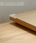 Eight Pack Silicone Corner Protectors for Baby Proofing and Home Safety on wooden table corner