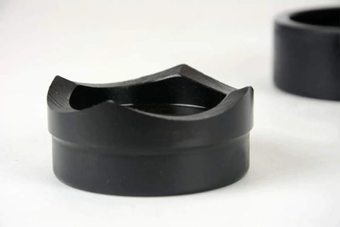 Close-up of conduit punch die from Conduit Punch And Die Set For Knockouts In 2-1/2, 3, 3-1/2 And 4 Inch Sizes, hardened tool steel.