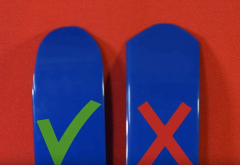 Close-up of blue Z-Liner Rim Tape Pair showing correct and incorrect shapes for 26, 27.5, and 29 inch wheels with markings.