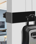Heavy Duty Door Mount Bracket For Lockboxes Featuring Slick Swivel Hooks And A Rock Solid Hold Perfect Realtor Essential Plus Vacation Rental Key Holder Quick Attach Black mounted on a door with a lockbox.