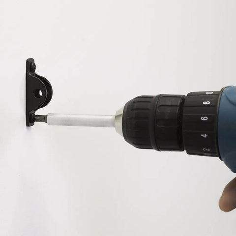 Heavy Duty Anti Tip Kit That Keeps Furniture From Falling Up To 400lbs With Tamper Resistant Steel Cable System being installed