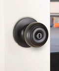 Classic Matte Black Door Knob With Lock For Bedroom And Bathroom, Brass Body, Steel Core, installed on a white door.