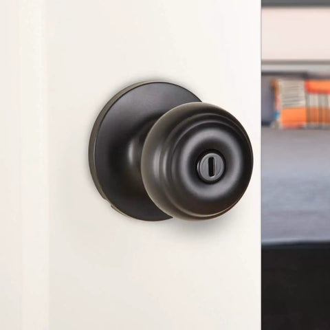 Classic Matte Black Door Knob With Lock For Bedroom And Bathroom, Brass Body, Steel Core, installed on a white door.