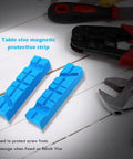 Magnetic Bench Vise Jaw Pads 2 Pack With Multi Groove Grips Vise Holder Protectors in blue on workbench with tools.