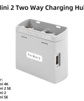 Dual Port Fast Charging Station For Two Drone Power Cells, Three Way Charger For Mini Series Drones on white background
