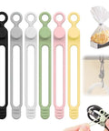 Dope Silicone Cable Organizer Set For Bundling And Fastening Wires And Headphones, 2025 Upgrade Reusable Cable Management, Elastic Cord Organizer For USB Cables, Earbuds, Chargers, Six Pack displayed in seven color variants.