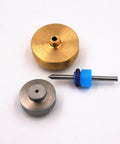 On/Off valve repair kit components: brass disk, gray disk, and blue plastic spacer with metal rod (3 pieces)