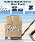 Front view of folding hand truck with extendable handle and wheels carrying stacked cardboard boxes (500 lb capacity).