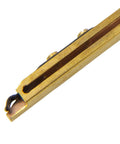 Straight Line Muzzleloader Capper For 11 Caps With Solid Brass Construction spring-loaded side view.