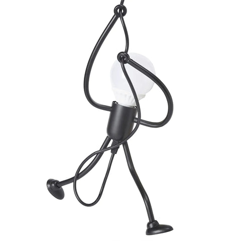 Swinging Man Pendant Light Fixture With Three Black Industrial Arms A Statement 3 Light Chandelier For Kitchen And Dining Hallway And Bedroom 47 Inch Hanging Stick Figure Lamp Modern Retro Style Gift showing a close-up of the stick figure design