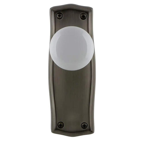 Prairie Plate With White Porcelain Lead Crystal Knob Door Passage Set In Antique Pewter showing solid brass plate detail