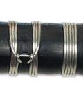 Heavy Duty 4 3/4 Inch Stainless Steel Wire Clamping Tool With Aluminum Bronze T Bar Nut Built To Last For Tough Wire Binding And Pulling Jobs Ideal For Industrial And Professional Wire Work A Real Workhorse clamping wires around a black pipe