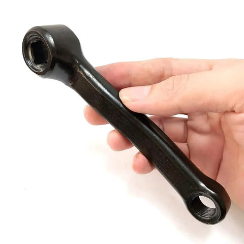 Hand holding 127mm Pedal Arm Crank For Indoor Cycling Replacement Left Or Right Round Pedal Hole With 13x13mm Square Mount