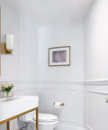 Gold Wall Sconce Set Of 2 Dimmable Vanity Lights With Milky White Cylinder Glass Shades mounted in a modern bathroom setting.