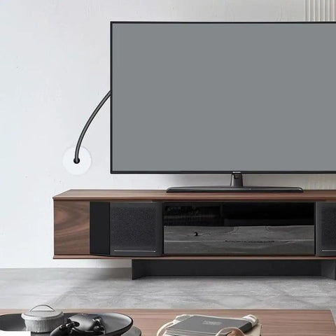 Super Sleek Black Plastic 3 4 Inch Wall Cable Grommets Starlink Routing Kit Pass Through Holes For Neat Wire Management On Desks And Tables To Keep Cords Hidden And Setup Looking Clean And Modern installed behind TV with cable through wall