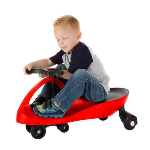 Child riding Wiggle Car Ride On Toy For Ages 3 And Up No Batteries Gears Or Pedals Just Twist Wiggle And Go Red Kid Friendly Toy
