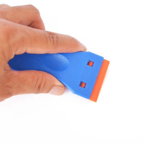 Hand holding 1.5 Inch Plastic Razor Scraper With Ten Double Edged Blades For Removing Labels, Stickers, And Decals From Glass Windows