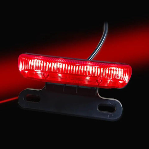 Slick E Bike Tail Light With Smart Brake Sensor For 36V To 48V Systems Ensures Your Night Rides Are Super Safe And Totally Lit For All The Commuters In Town, red ABS rear light with wiring harness
