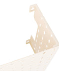 Close-up of Wall Mounted Pegboard Kit With Adhesive Pads for Kitchen Organization and Decoration showing perforated corner panel.