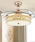 Top Shelf 42 Inch Invisible Ceiling Fan With Smooth Led Lighting Smart Folding Blades Barely Noticeable Spin Energy Efficient Wireless Remote Control For Kitchen Or Home Office, in gold with illuminated glass shade.