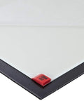 Low-Profile Framed Floor Mat With Sticky Dirt-Grabbing Surface And Durable Backing, White On Black, 31.5 In X 25.5 In corner detail