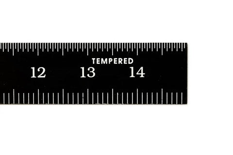 Kickass Flexible Metric Metal Ruler With Matte Black Chrome Coating showing tempered markings at 12, 13, and 14 mm.