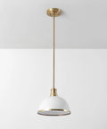 Dope Modern Glam 1 Light Pendant Light with Matte White Finish and Brass Accents against ceiling