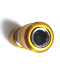 Brass socket sleeve adapter with hex socket end and screwdriver bit extension, close-up view.