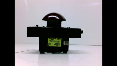Built Tough 2 1/4 Inch Red Plastic Mushroom Plunger Switch With Latch, side view for heavy duty tractors and industrial use.