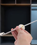 Hand holding 2 Pack Silver Round Disc Hinges For Jewelry Boxes And Cabinets Iron Lid Support Hinges