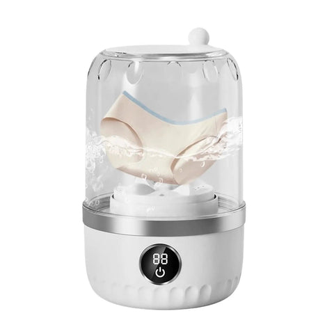 Compact Portable Washing Machine For Travelers And Students Slick Laundry Appliance washing underwear in clear container with water.