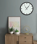 Room setting with wall clock using High Torque Silent DIY Wall Clock Movement Kit With Two Quartz Movements, sleek black design.