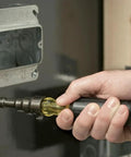 Person using Workhorse Reaming Driver Kit With Conduit Reamer And Magnetic Level For Quick Wire Runs on electrical box, 3-piece set displayed.