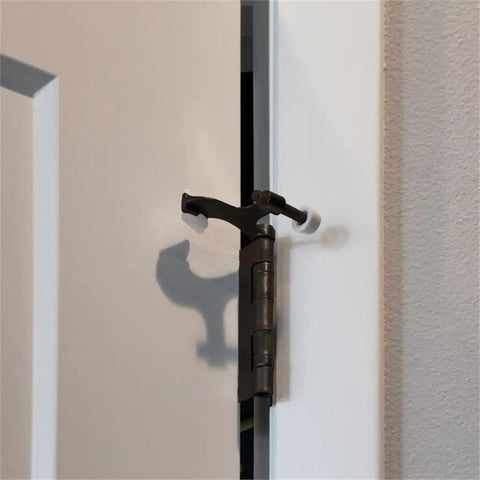 Durable Oil Rubbed Bronze Hinge Pin Door Stops 5 Pack Zinc Alloy adjustable 85 to 125 degrees on white door in use