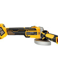 No Fuss Brushless Cordless Angle Grinder With Clear Digital Speed Dial For Sharp Cutting And Silky Smooth Polishing Fits Standard 18V Packs Comes Loaded With Two 4.0Ah Batteries Made For Weekender Projects And Hardcore Daily Grind At The Shop. Side view of cordless angle grinder with yellow and black design, digital controls, and polishing disc.