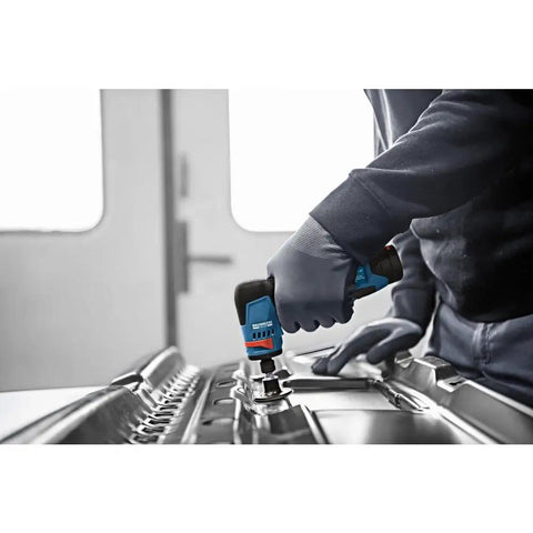 Compact 12 Volt Max Brushless Right Angle Die Grinder With Variable Speed Trigger And Five Speed Options in use on metal surface.
