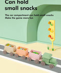 Game Changing BPA Free Silicone Toy Train For The Kiddos Push And Pull Stacking Blocks in bright colors holding snacks